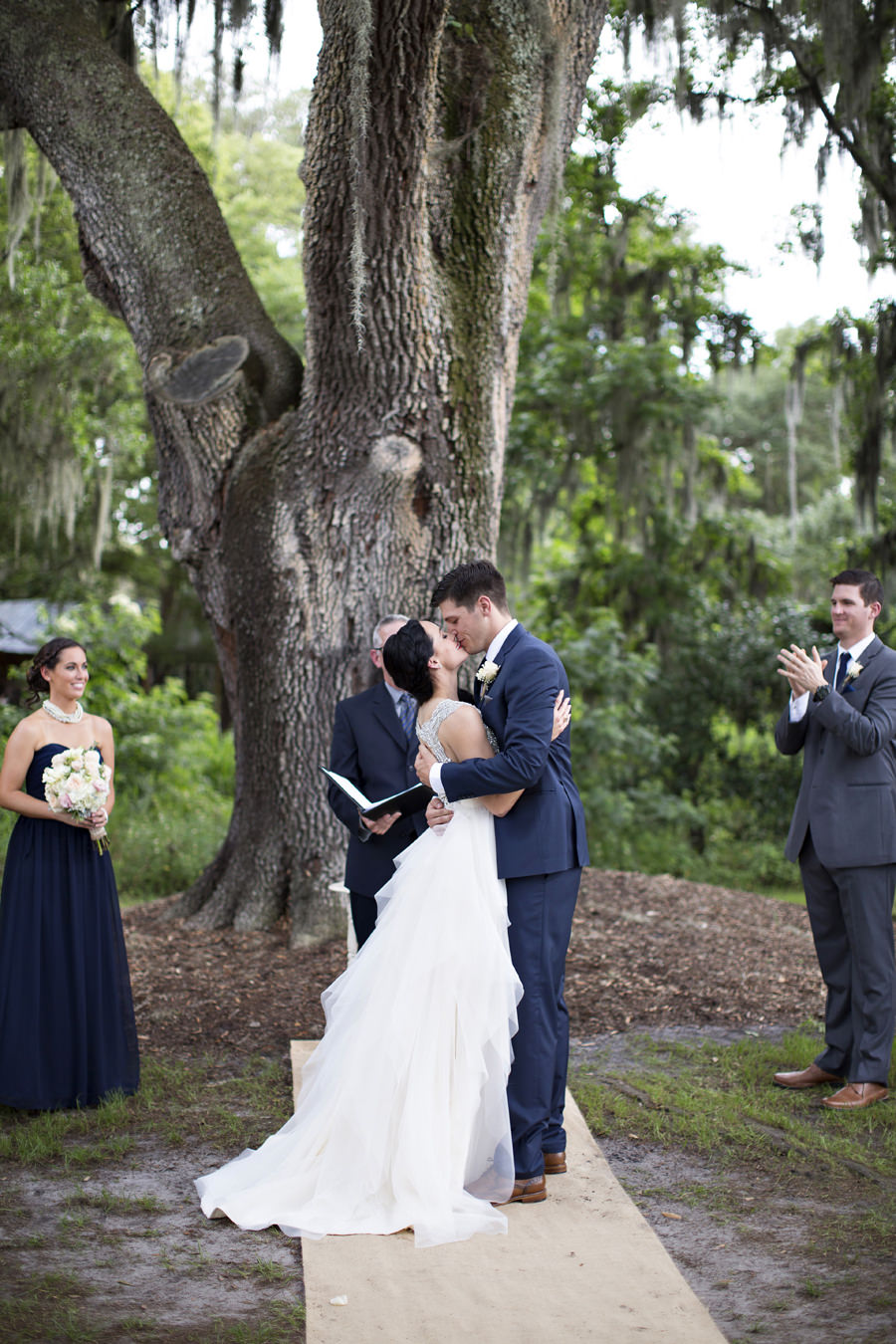 Outdoor Wedding Ceremony Bride and Groom First Kiss | Tampa Bay Wedding Venue Cross Creek Ranch | Wedding Photographer Djamel Photography