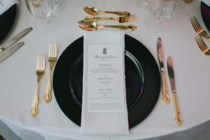 Gold Black and White Table Setting with Black Charger Plate and White Menu with Black Lettering | Wedding Reception Decor and Inspiration | Sarasota Wedding Planner Jennifer Matteo Event Planning