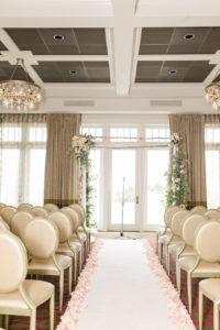 Ivory, Blush and Gold Wedding Ceremony Ideas and Inspiration with Blush Rose Petals and Arch with Ivory and Blush Florals with Gold Banquet Chairs | St. Petersburg Wedding Venue The Birchwood | Tampa Bay Wedding Photographer Ailyn La Torre Photography