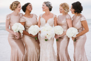 St. Pete Beach Bride in Ivory Lace Martina Liana Gown with Bridesmaids in Gold Sequin Dresses Wedding Portrait | St. Petersburg Wedding Venue The Don CeSar | Tampa Bay Wedding Photographer Jonathan Fanning Studio and Gallery