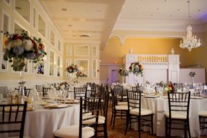 Elegant and Classic Wedding Reception with Ivory, Blue and Cranberry Centerpieces in Tall Glass Vase at Tampa Wedding Venue Palma Ceia Country Club | Photography by Andi Diamond Photography