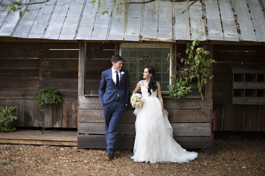 Outdoor Bride and Groom Wedding Portrait with Rustic Barn with Tin Roof | Tampa Bay Wedding Venue Cross Creek Ranch | Wedding Photographer Djamel Photography