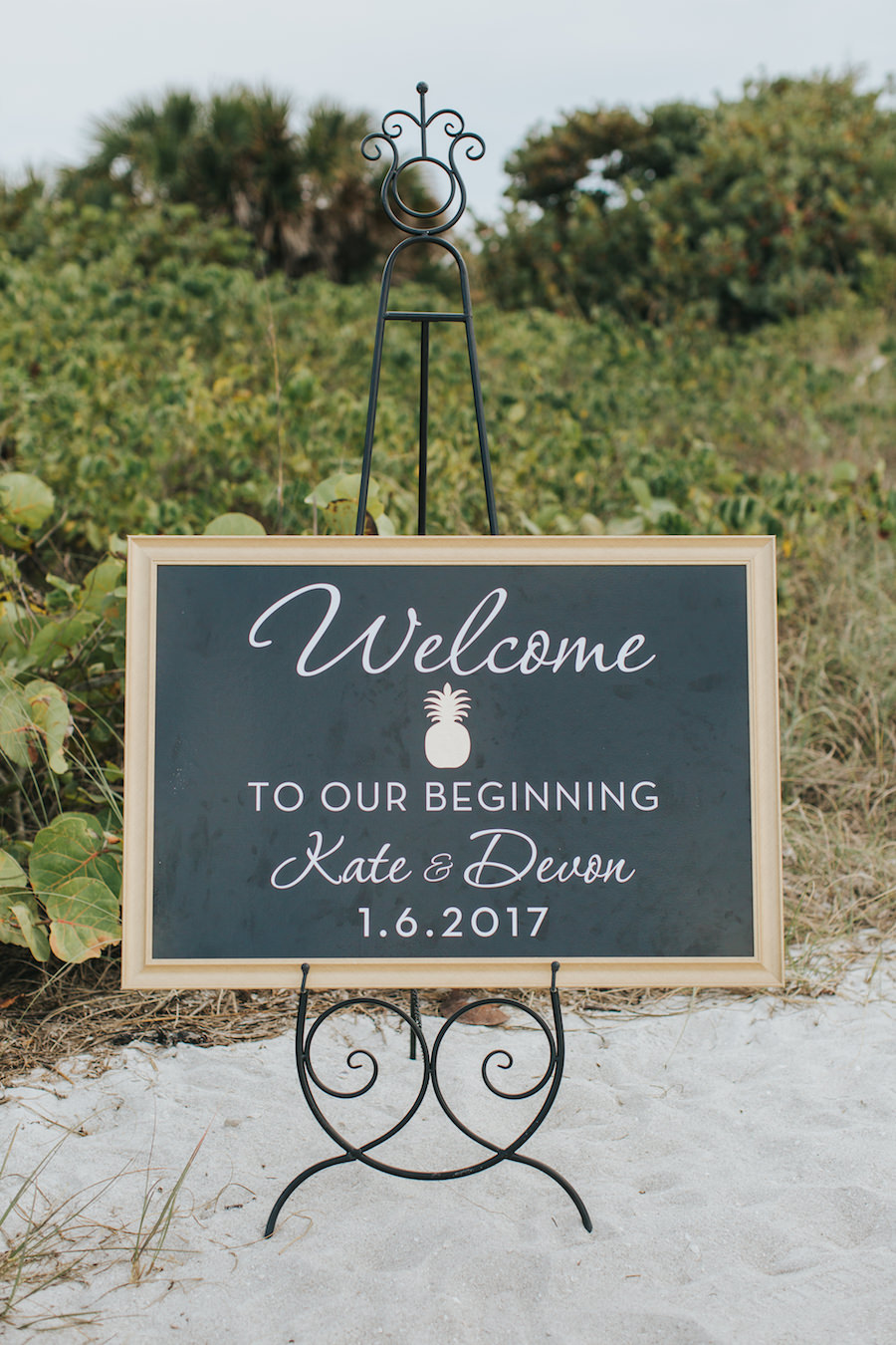 Wedding Ceremony Welcome Sign on Black Chalkboard with White Writing and Gold Pineapple Accent | Sarasota Wedding Planner Jennifer Matteo Event Planning