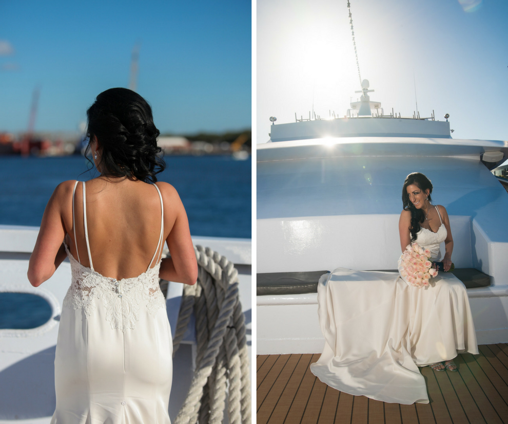 Tampa Bridal Portrait in Ivory Satin Sheath Wedding Dress and Light Pink Rose Wedding Bouquet on The Yacht Starship II Tampa Wedding Venue