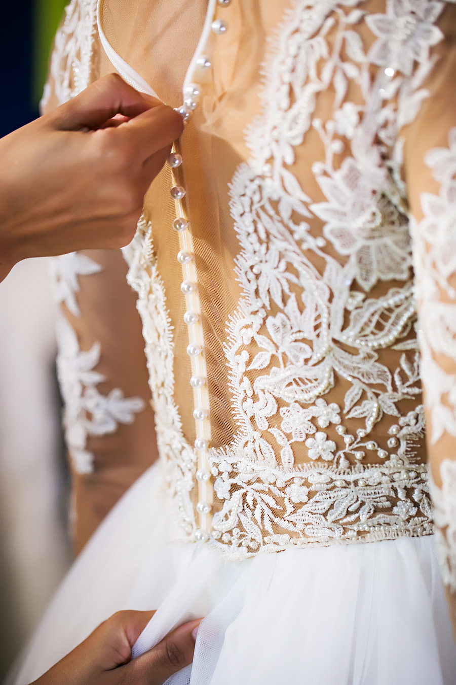 Bride Getting Dressed | Nude Illusion Lace Wedding Dress with Sleeves | Tampa Bay Bridal Shop Isabel O'Neil Bridal | Wedding Photographer Limelight Photography