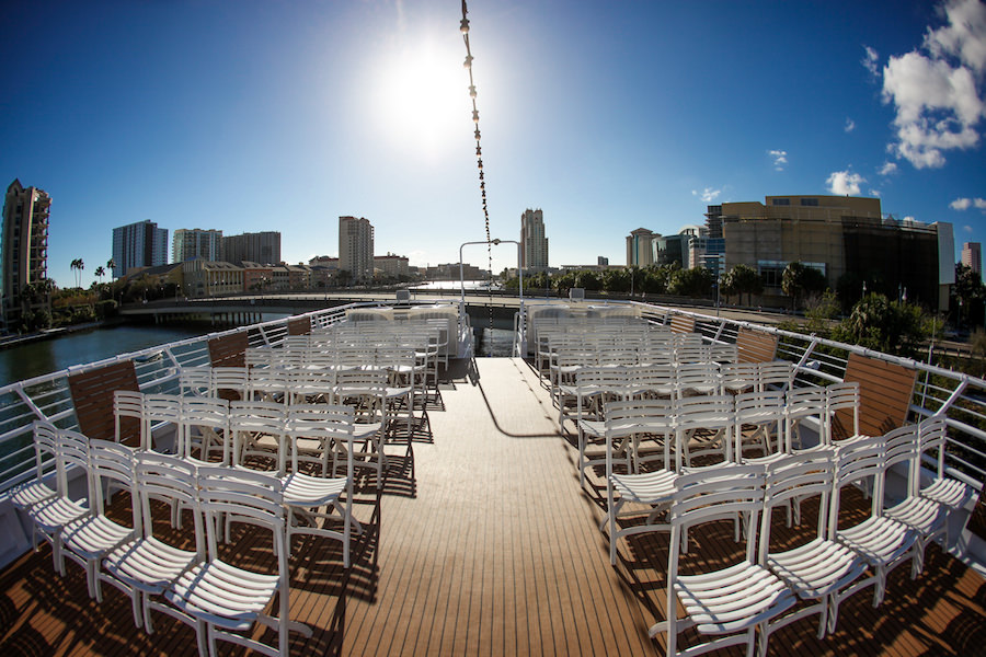 Tampa Boat Wedding Ceremony Venue with White Resin Folding Chairs on the Yacht Starship II
