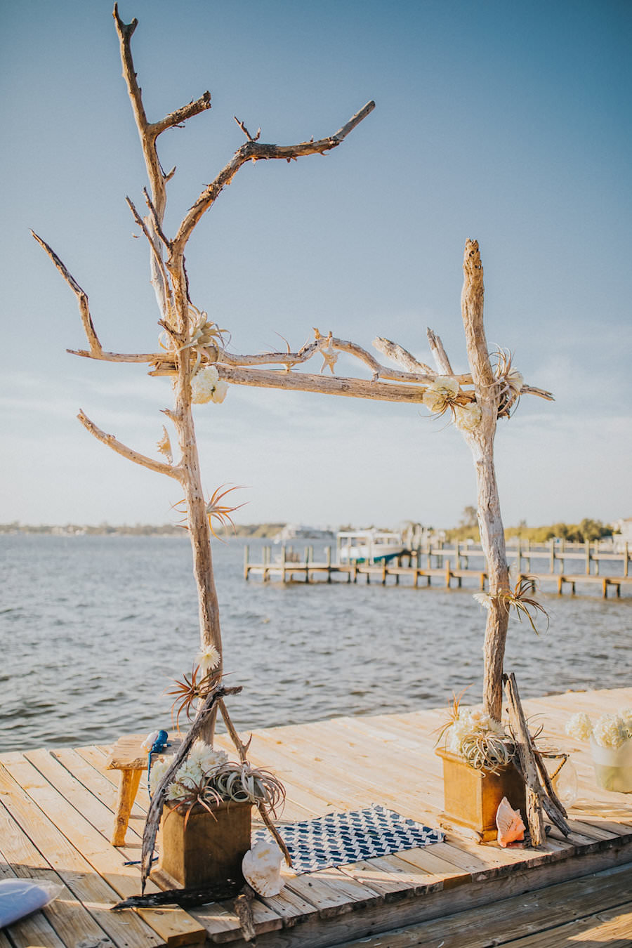 Nautical Inspired Waterfront Wedding Ceremony Arbor of Driftwood, Succulents and Seashells | Wedding Ceremony Arch Inspiration