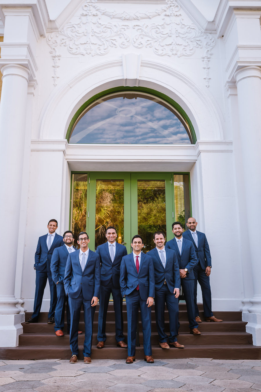 Downtown St. Pete Bridal Party Groomsmen in Navy Blue Suits | Wedding Videography by Imagery Wedding Films