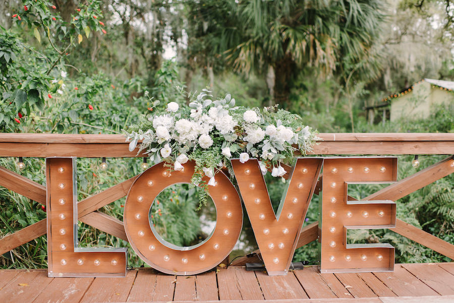 Rustic Wedding Decor LOVE Marquee Letters with Ivory Roses and Eucalyptus Cascading Floral Centerpiece
