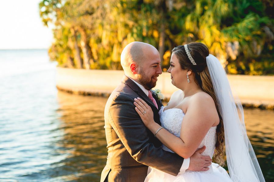 Bride and Groom Waterfront Sunset Wedding Portrait | Sarasota Wedding Photographer Grind and Press Photography | Hair and Makeup Michele Renee The Studio