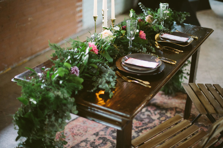 Florida, Modern Bohemian Inspired Styled Shoot | Vintaged Wooden Sweetheart Table with Folding Chairs and Greenery Garland Decor and Gold Flatware and Charger Plates | Tampa Bay Wedding Planner Glitz Events