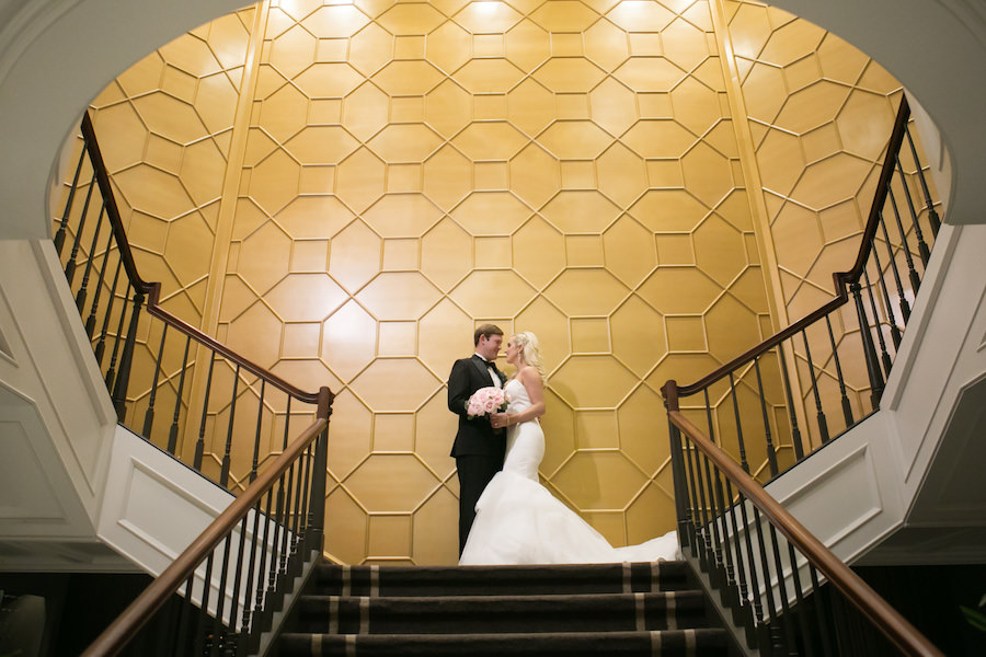 Bride and Groom Wedding Portrait on Staircase with Pink Bridal Bouquet | Wedding Venue The Tampa Club | Tampa Bay Wedding Photographer Carrie Wildes Photography | Wedding Florist Northside Florist