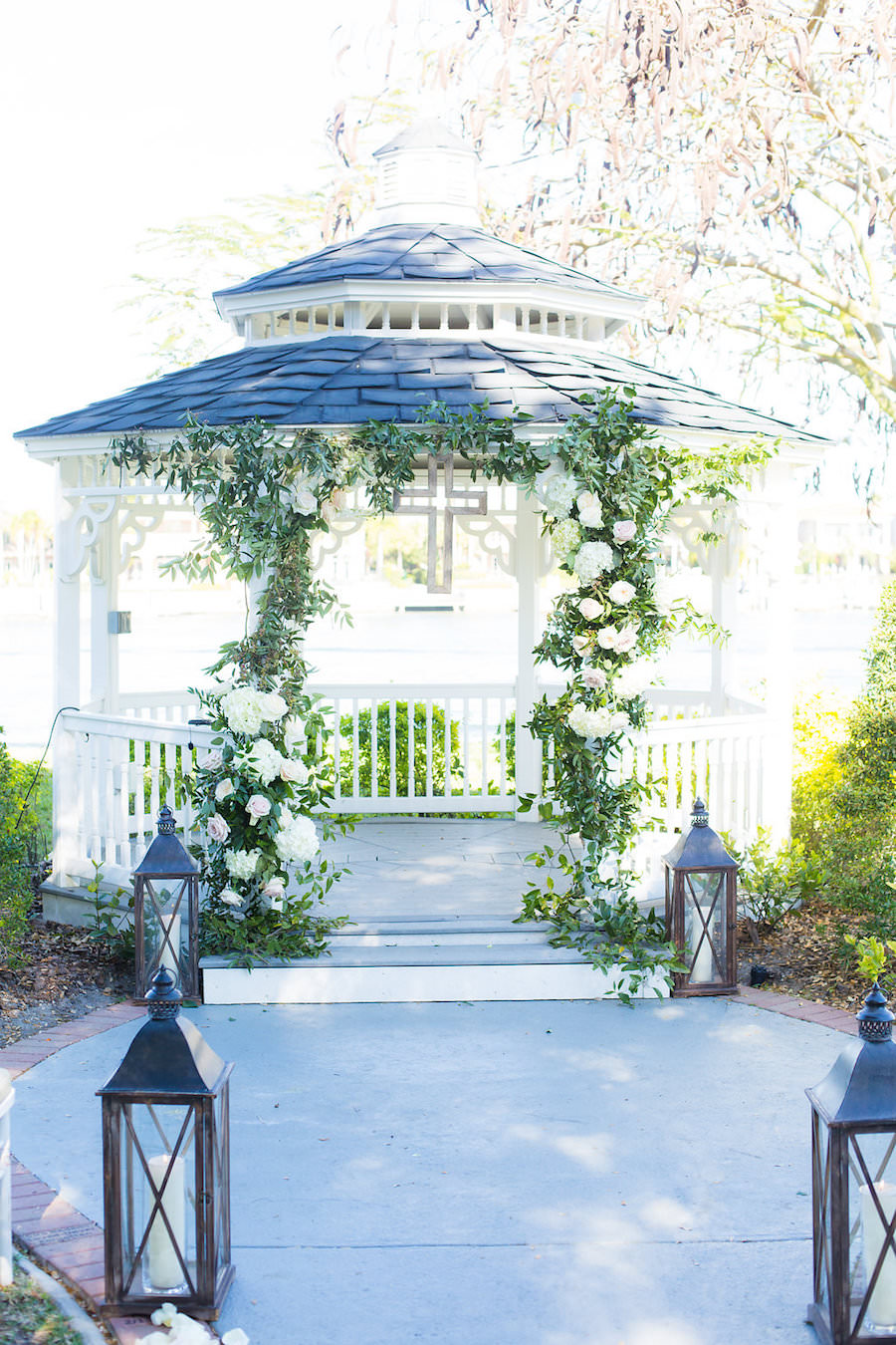 Outdoor Garden Wedding Under Gazebo with Wedding Arch of Greenery and Ivory Flowers | Tampa Wedding Photographer Kera Photography | Venue Davis Islands Garden Club