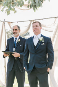 Groom's Reaction Wedding Portrait to Watching Bride Walk Down the Aisle