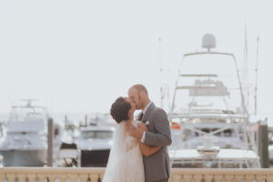 Bride and Groom Waterfront Wedding Portrait at Westshore Yacht Club | South Tampa Wedding Venue Westshore Yacht Club | Tampa Bay Wedding Videographer Bonnie Newman Creative