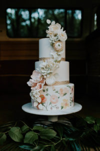 3-Tier Round Hand Painted Wedding Cake with Cascading Sugar Flowers and Gold Leaf Boarder | Retro Vintage Boho Wedding Inspiration | Tampa Wedding Cake Bakery Hands on Sweets