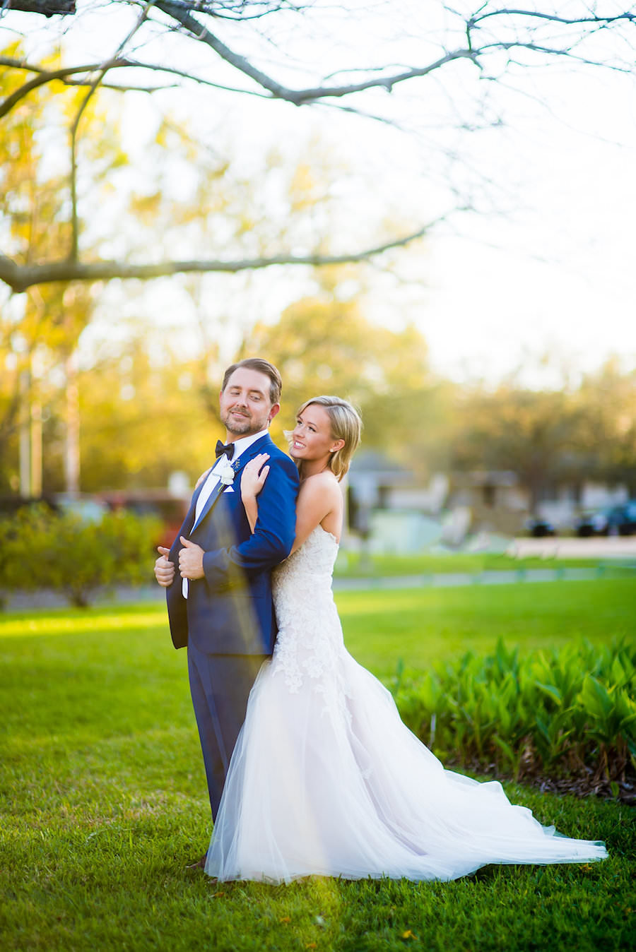 Bride and Groom Wedding Day Portrait in Ivory Lace Alvina Valenta Wedding Dress with Tulle Skirt | Tampa Wedding Photographer Kera Photography