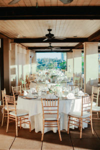 Outdoor Sarasota Wedding Reception with Gold Chiavari Chairs and Ivory and Blush Table Arrangements | Sarasota Wedding Planner NK Productions