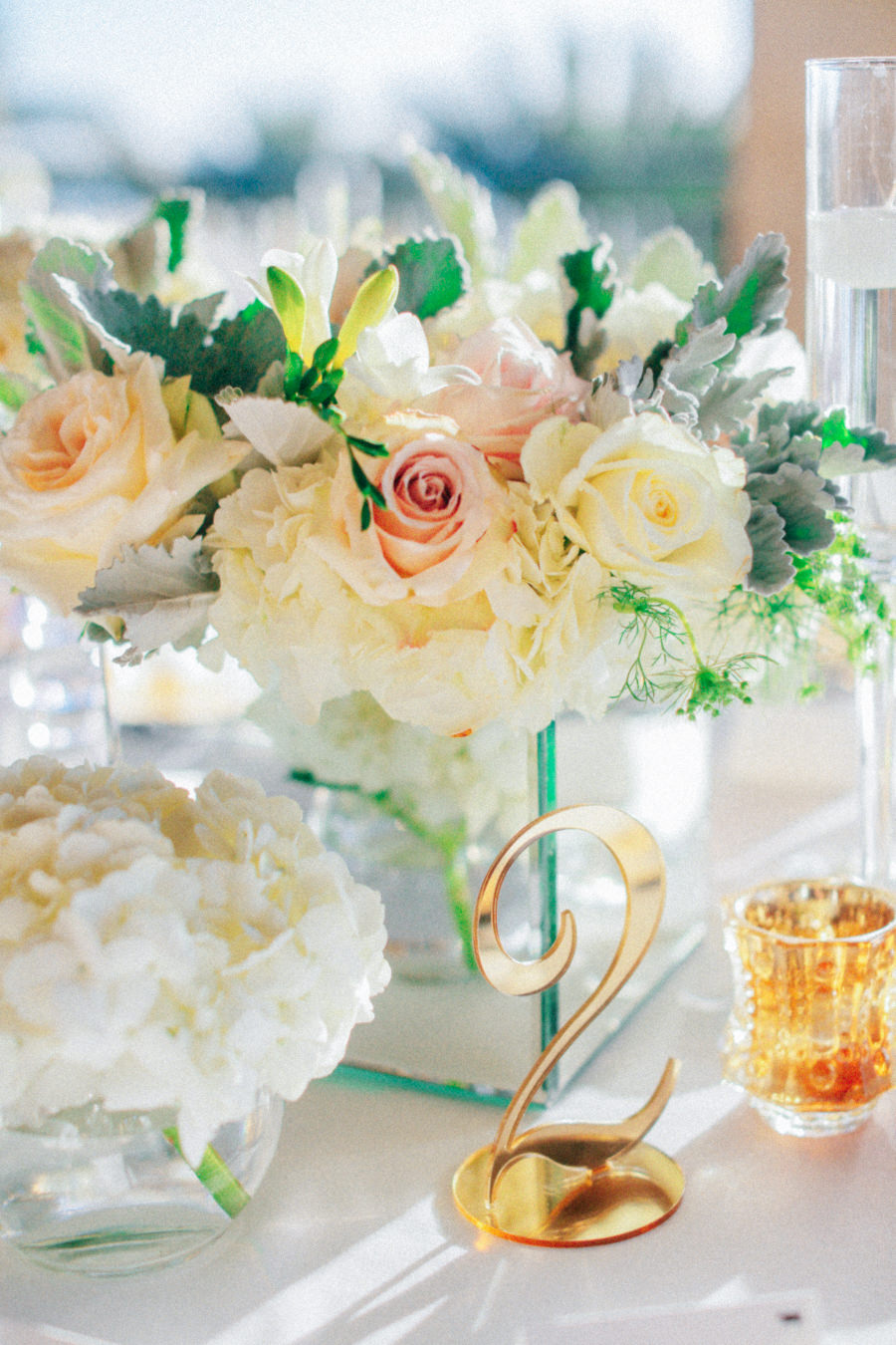 Blush Pink and Ivory Low Centerpiece Floral Decor with Gold Table Numbers | Sarasota Wedding Planner NK Productions