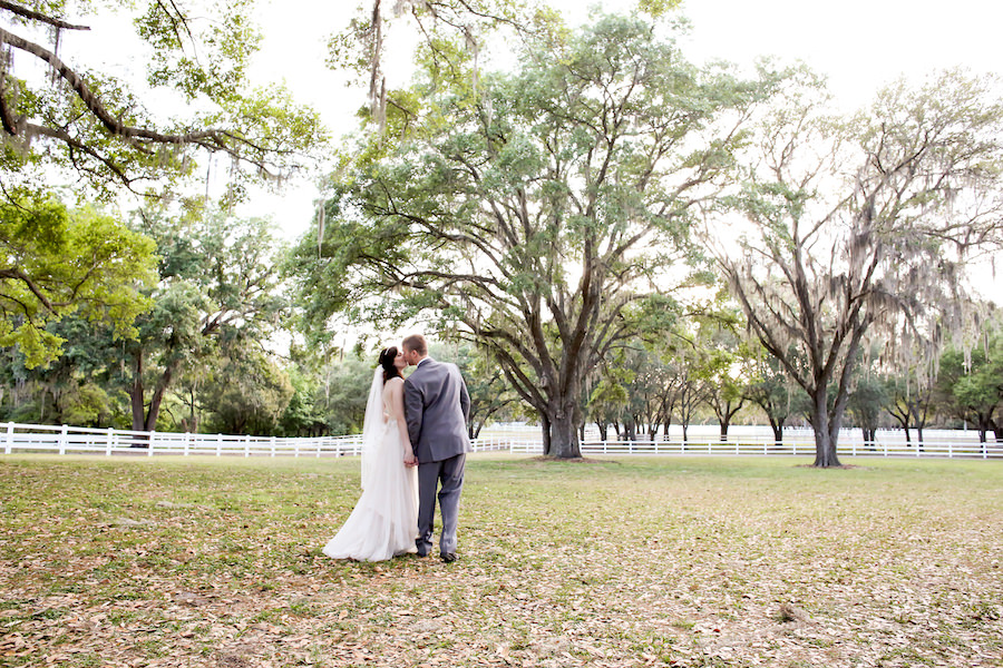 Bride and Groom Rustic Outdoor Wedding Portrait at Tampa Bay Wedding Venue The Lange Farm
