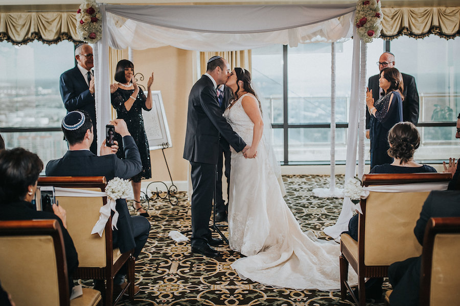 Bride and Groom Indoor Jewish Wedding Ceremony with City Skyline View | Downtown Tampa Wedding Photographer Rad Red Creative | Private Event Venue The Tampa Club