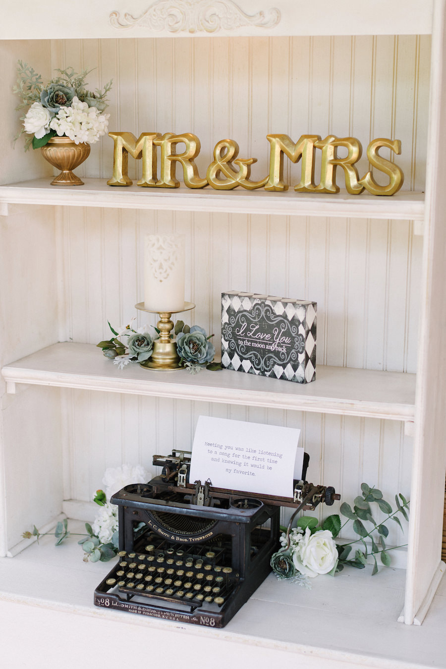 Rustic Vintage Wedding Decor with Vintage Typewriter, White Floral Accents and Gold Mr and Mrs Monogram