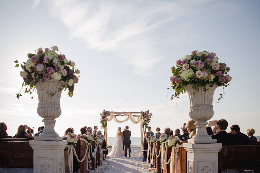 White and Blush Pink Dusty Rose Wedding Ceremony Floral Arrangement with White Ivory Hydrangeas with Greenery on Bamboo Wooden Altar with Draping | Clearwater Beach Wedding Planner Parties a la Carte | Photographer Marc Edwards Photographs