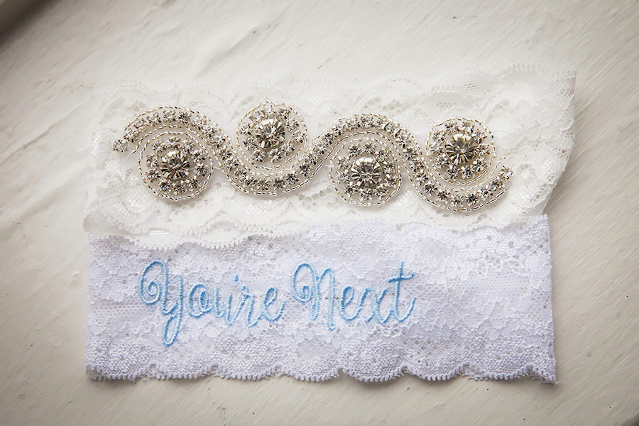 Lace Wedding Garter With Rhinestone Detail and Light Blue "You're Next" Embroidery | St Pete Wedding Photographer Limelight Photography
