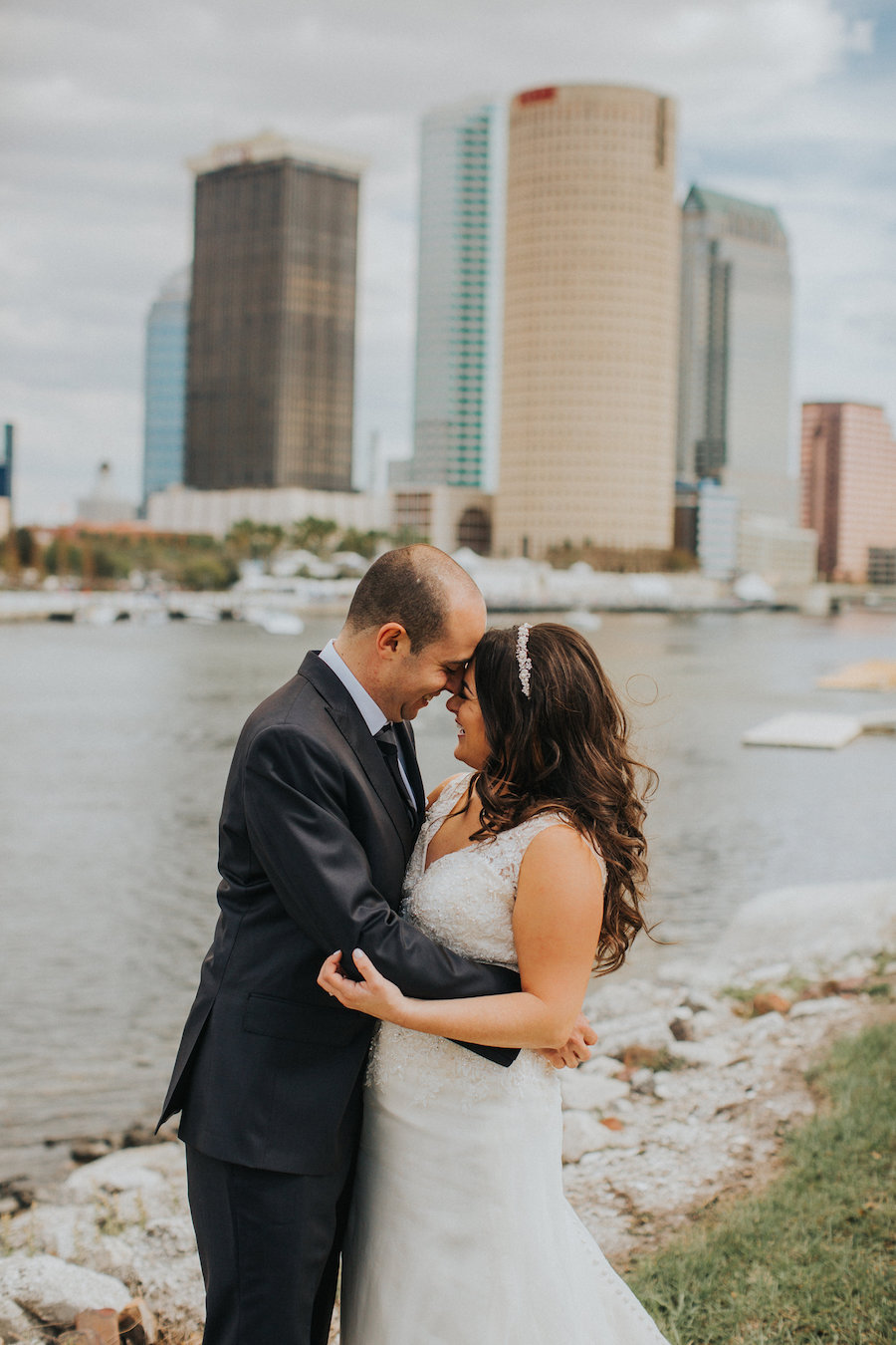 Bride and Groom Wedding Portrait with City Skyline and Waterfront View | Downtown Tampa Wedding Photographer Rad Red Creative