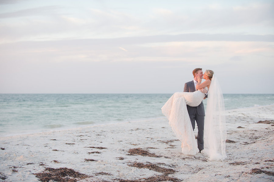 Bride and Groom Oceanfront Clearwater Beach Wedding Portrait in the Sand | Clearwater Beach Wedding Planner Parties a la Carte | Photographer Marc Edwards Photographs