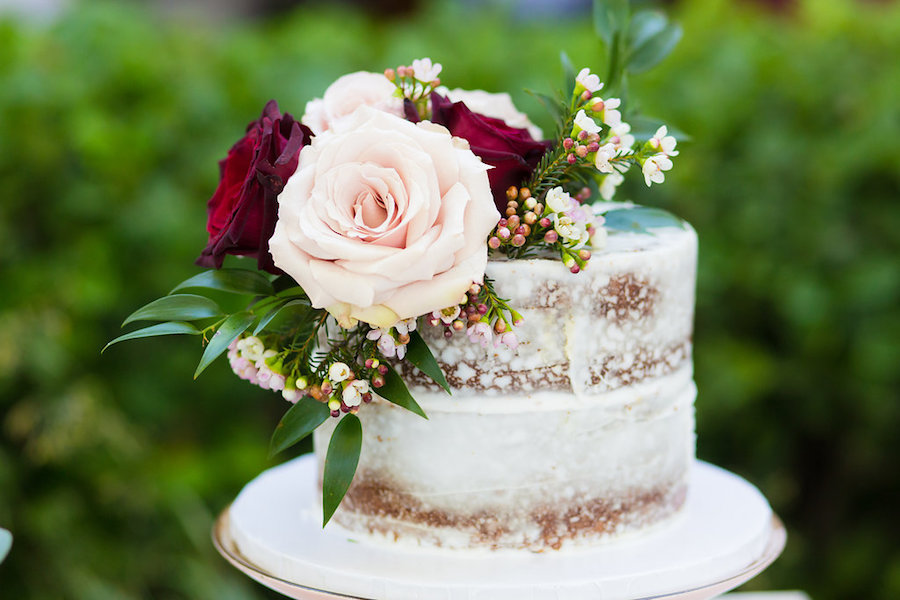Naked Two Tier Wedding Cake with Blush and Merlot Colored Roses with Greenery | Tampa Wedding Photography by Kera Photography