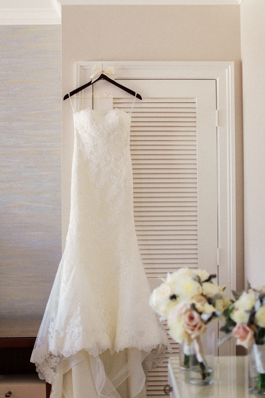 White Sweetheart Strapless Lace Pronovias Wedding Dress with Bridal Bouquet Portrait
