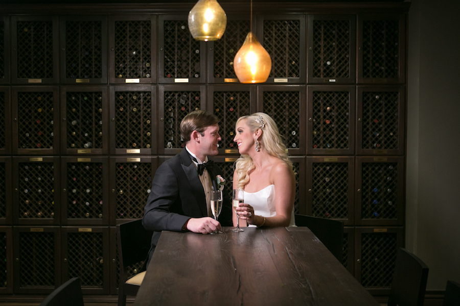 Bride and Groom Wedding Portrait with Champage in Wine Room | Wedding Venue The Tampa Club | Tampa Wedding Photographer Carrie Wildes Photography