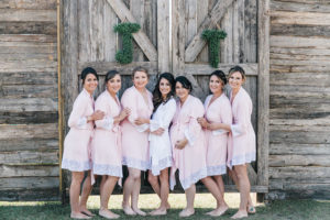 Bridesmaids in Matching Blush Pink Bridal Party Robes