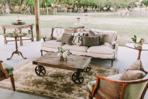 Rustic, Outdoor Sarasota Barn Wedding Reception Guest Seating Area with Vintage Furniture | Sarasota Wedding Planner Jennifer Matteo Event Planning