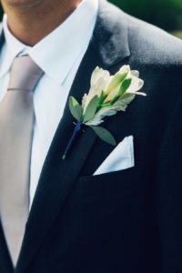 Groom with Ivory Boutonnière with Grey Tie Wedding Portrait
