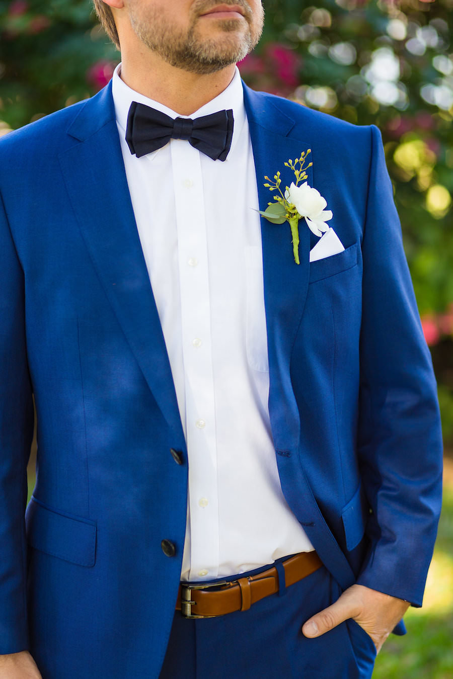 Groom Wedding Day Portrait in Blue Suit with Navy Bowtie and Ivory Floral Boutonniere | Tampa Wedding Photographer Kera Photography