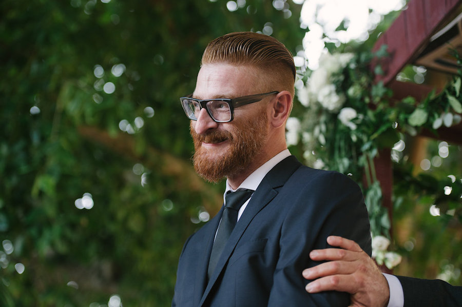Wedding Portrait of Groom's Reaction Seeing Bride for the First Time