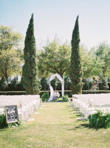 Outdoor Romantic Rustic Inspired Wedding Ceremony with White Folding Chairs | Tampa Bay Garden and Ballroom Wedding Venue The Palmetto Club at FishHawk Ranch