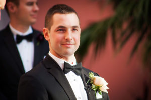 Wedding Ceremony Portrait of Florida Groom in Tuxedo Waiting for Bride by St. Pete Wedding Photographer Limelight Photography
