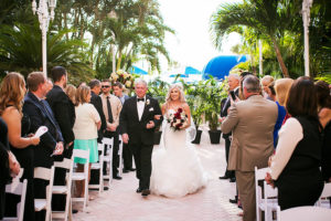 Outdoor Florida Wedding Ceremony Portrait of Bride and Father Walking Down the Aisle | St Pete Beach Wedding Venue The Don CeSar Hotel | Limelight Photography