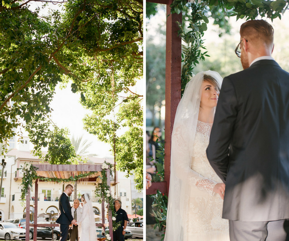 Bride and Groom Wedding Ceremony Portrait under Chuppah | Outdoor Florida Jewish Wedding Ceremony in Downtown St. Pete under Oak Trees