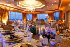 Gold Wedding Reception Decor with Long Feasting Table, Sequined Linen Runner and Lanterns with Candles | Elegant, Romantic Reception Decor Ideas | Waterfront Nautical St. Petersburg Wedding Venue Isla Del Sol Yacht & Country Club | Photographer Brian C. Idocks Photographics