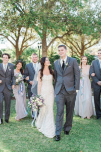Outdoor Tampa Bay Bridal Party with Bride and Groom Wedding Portrait | Wtoo Ivory Strapless Wedding Dress | Groomsmen in Grey