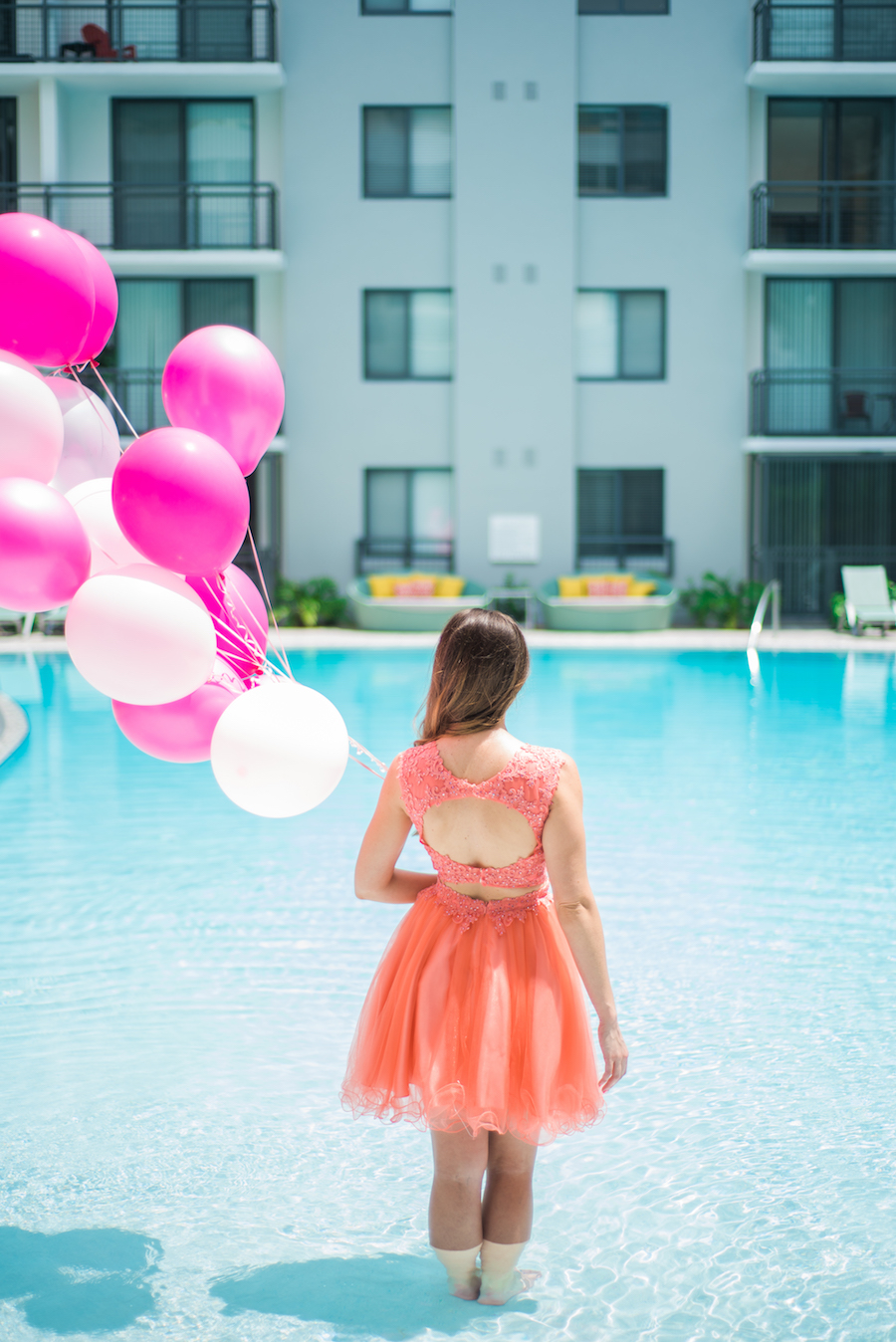 Pink Birthday Party Dress from Lending Luxury with Balloons in Pool | Modern Colorful Birthday Party Inspiration and Decor | Tampa Bay Portrait and Wedding Photographer Kera Photography