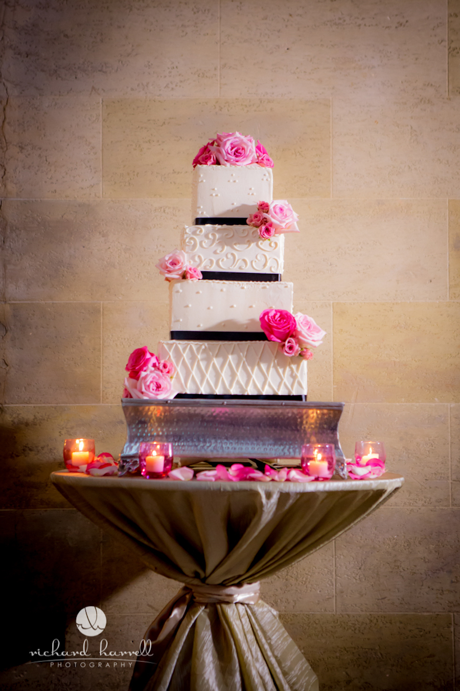 Four Tiered Square Wedding Cake With White Black And Pink Decor