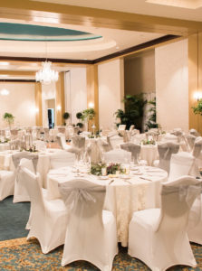 Ballroom Wedding Reception with Ivory Chair Covers and Lace Table Runners | Tampa Bay Garden and Ballroom Wedding Venue The Palmetto Club at FishHawk Ranch