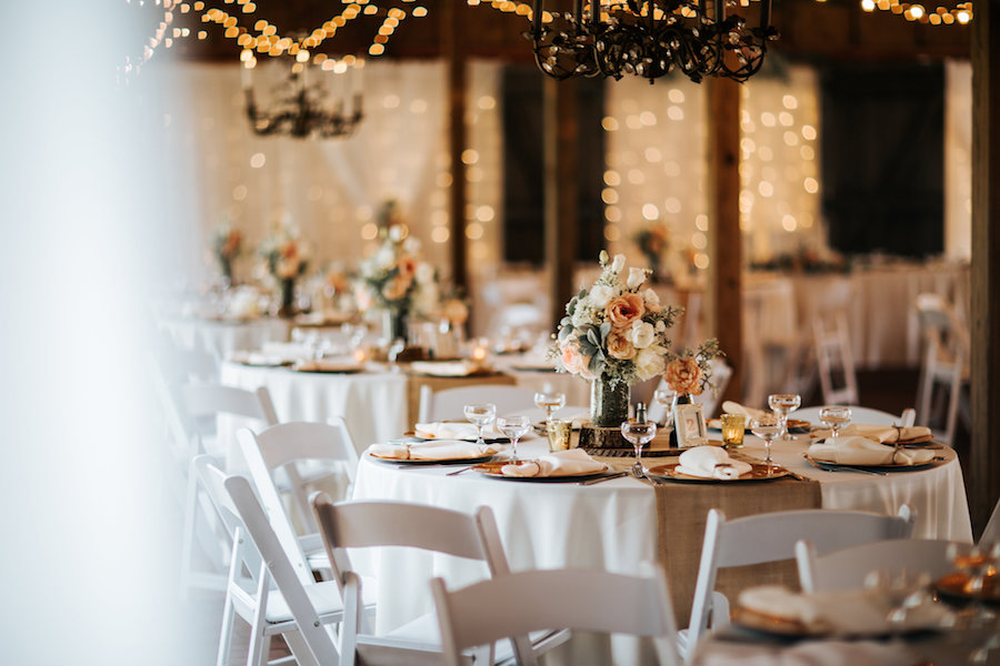 Outdoor, Florida Barn Wedding Reception with Burlap Table Runners and White Folding Chairs | Rustic Florida Wedding Venue Cross Creek Ranch