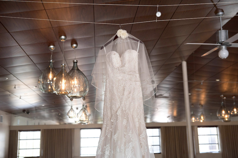 Vintage Suitcase and Hanging Lanterns with White Lace Wedding Dress and Veil | St. Pete Beach Photographer Kristin Marie Photography