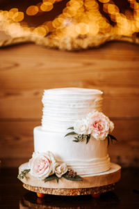 Rustic, Inspired Wedding Dessert Bar with Two Tier White Ruffled Wedding Cake with Floral Accents by Alessi Bakery